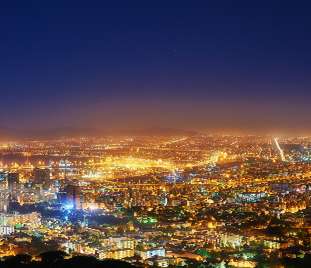 vecteezy_night-sky-and-city-with-lights-buildings-and-cape-town_72004221